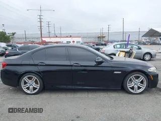 2015 BMW 5 Series 535i with VIN WBA5B1C55FG128387, listed as a IAAI auction lot 41885806 with 94,734 mi miles and . Bid and sale history available at carsss.com. Image 13.