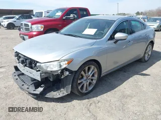 2017 Mazda Mazda6 Touring with VIN JM1GL1V52H1126639, listed as a IAAI auction lot 41802868 with 181,948 mi miles. Bid and sale history available at carsss.com. Image 2.