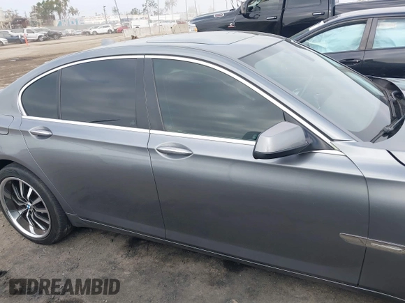 2012 BMW 7 Series 740i with VIN WBAKA4C52CC613676, listed as a IAAI auction lot 42509312 with 113,971 mi miles and . Bid and sale history available at DreamBid. Image 13.