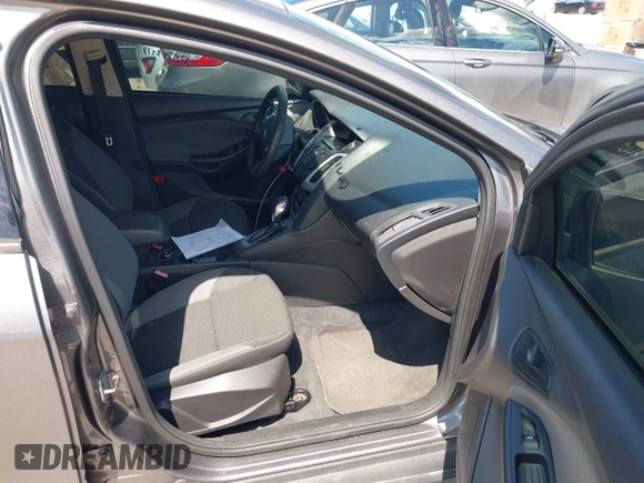 2012 Ford Focus SE with VIN 1FAHP3F28CL211898, listed as a IAAI auction lot 42466544 with 142,933 mi miles and . Bid and sale history available at DreamBid. Image 5.