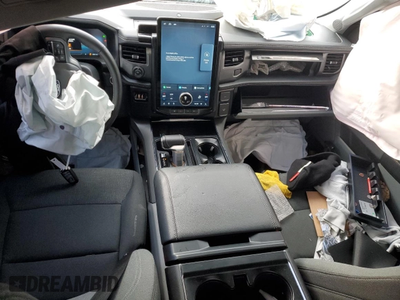 2024 Ford F-150 Lightning Flash with VIN 1FT6W3L78RWG02447, listed as a Copart auction lot 79717984 with 2,081 mi miles and Salvage Title. Bid and sale history available at DreamBid. Image 8.