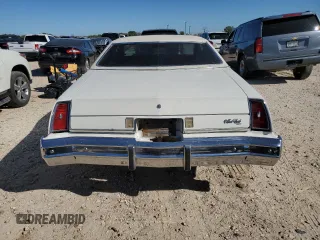 1974 Chevrolet Monte Carlo z VIN 1H57H4R75663, wystawiony jako Copart lot #81492924 z przebiegiem 90 431 mil mil oraz Tytuł czysty. Historia ofert i sprzedaży dostępna na DreamBid. Obrazek 7.