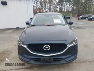 2017 Mazda CX-5 Touring with VIN JM3KFBCL9H0163449, listed as a IAAI auction lot 41919020 with 102,898 mi miles. Bid and sale history available at carsss.com. Image 12.