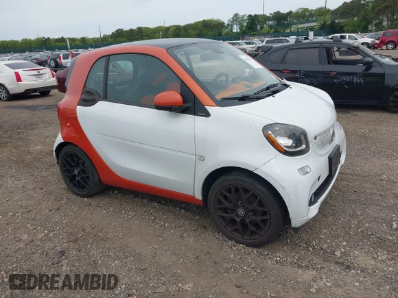 2016 Smart fortwo Passion z VIN WMEFJ5DA0GK068810, wystawiony jako IAAI lot #42344913 z przebiegiem 68 724 mil mil oraz . Historia ofert i sprzedaży dostępna na DreamBid. Obrazek 1.