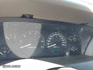 2003 Jeep Grand Cherokee Laredo with VIN 1J4GW48S33C556441, listed as a IAAI auction lot 42026804 with 189,143 mi miles. Bid and sale history available at carsss.com. Image 7.