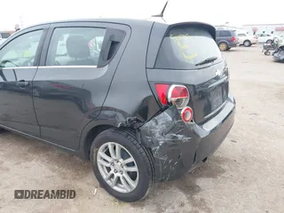 2014 Chevrolet Sonic LT with VIN 1G1JC6SH5E4153094, listed as a IAAI auction lot 41506576 with 118,833 mi miles. Bid and sale history available at carsss.com. Image 6.