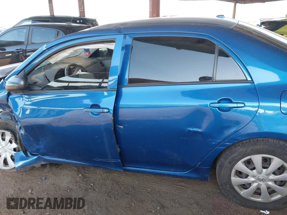 2009 Toyota Corolla with VIN JTDBL40E399054551, listed as a IAAI auction lot 42004147 with 1 mi miles. Bid and sale history available at carsss.com. Image 13.