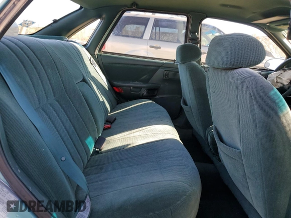 1995 Ford Taurus GL z VIN 1FALP5242SG181625, wystawiony jako Copart lot #81184774 z przebiegiem 107 385 mil mil oraz Szkoda całkowita • Salvage title. Historia ofert i sprzedaży dostępna na DreamBid. Obrazek 10.