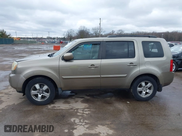 2009 Honda Pilot EX-L with VIN 5FNYF48569B002035, listed as a IAAI auction lot 41838347 with 198,849 mi miles. Bid and sale history available at carsss.com. Image 15.