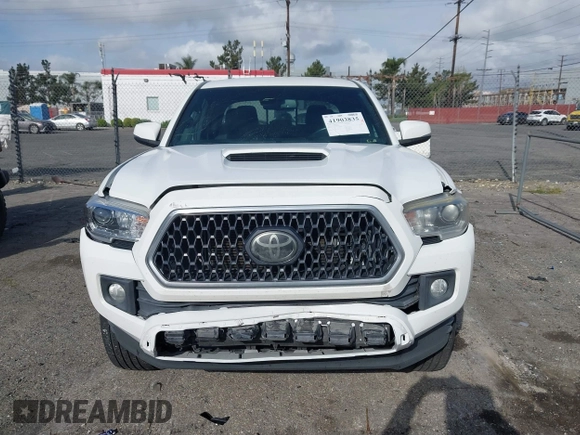 2018 Toyota Tacoma SR5 with VIN 3TMBZ5DN7JM016650, listed as a IAAI auction lot 41903835 with 105,123 mi miles and . Bid and sale history available at DreamBid. Image 13.
