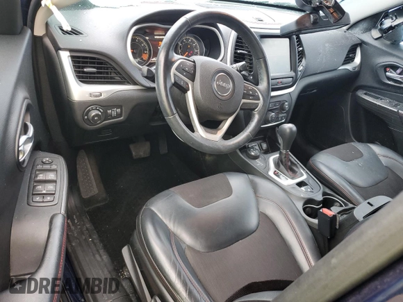 2015 Jeep Cherokee Trailhawk with VIN 1C4PJMBB8FW740452, listed as a Copart auction lot 63023715 with 96,236 mi miles and Salvage title. Bid and sale history available at DreamBid. Image 8.
