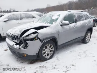 2015 Jeep Cherokee Latitude with VIN 1C4PJLCS4FW590087, listed as a IAAI auction lot 41313014 with NaN miles. Bid and sale history available at carsss.com. Image 2.