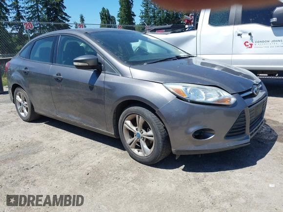 2013 Ford Focus SE z VIN 1FADP3F26DL266821, wystawiony jako IAAI lot #42677519 z przebiegiem 155 238 mil mil oraz . Historia ofert i sprzedaży dostępna na DreamBid. Obrazek 1.