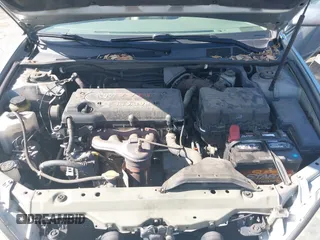 2005 Toyota Camry LE z VIN 4T1BE30K65U592500, wystawiony jako IAAI lot #42373718 z przebiegiem 189 054 mil mil oraz . Historia ofert i sprzedaży dostępna na DreamBid. Obrazek 10.