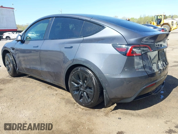 2022 Tesla Model Y Long Range z VIN 7SAYGAEE9NF574634, wystawiony jako IAAI lot #42040719 z przebiegiem 29 675 mil mil oraz . Historia ofert i sprzedaży dostępna na DreamBid. Obrazek 3.