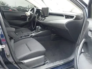 2023 Toyota Corolla LE with VIN JTDB4MEE5PJ006860, listed as a IAAI auction lot 41787964 with 18,883 mi miles. Bid and sale history available at carsss.com. Image 5.