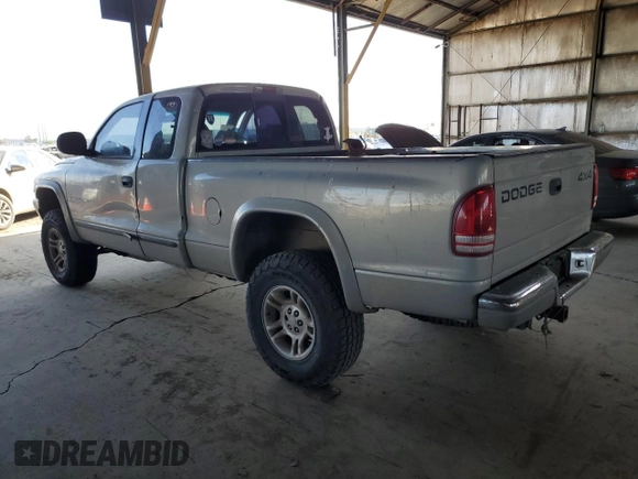 1999 Dodge Dakota SLT with VIN 1B7GG22Y0XS259031, listed as a Copart auction lot 87972505 with 153,354 mi miles and Salvage Title. Bid and sale history available at DreamBid. Image 2.