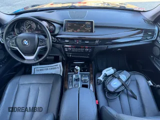 2016 BMW X5 xDrive40e z VIN 5UXKT0C56G0S75145, wystawiony jako Copart lot #57847615 z przebiegiem 101 850 mil mil oraz Tytuł czysty. Historia ofert i sprzedaży dostępna na DreamBid. Obrazek 9.