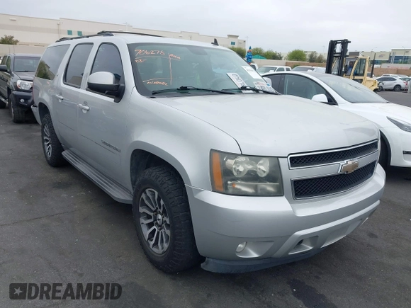 2010 Chevrolet Suburban LT with VIN 1GNUCJE03AR238548, listed as a IAAI auction lot 42104596 with 153,959 mi miles and . Bid and sale history available at DreamBid. Image 1.