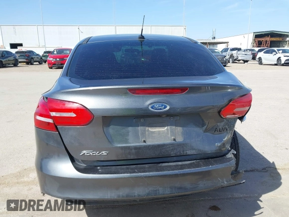 2018 Ford Focus SE with VIN 1FADP3F2XJL302358, listed as a IAAI auction lot 41807622 with 76,145 mi miles. Bid and sale history available at carsss.com. Image 16.