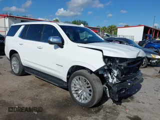 2023 Chevrolet Tahoe Premier with VIN 1GNSKSKD0PR453465, listed as a IAAI auction lot 42512099 with 23,252 mi miles and . Bid and sale history available at DreamBid. Image 1.