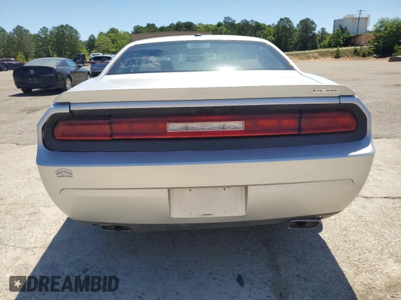 2012 Dodge Challenger R/T z VIN 2C3CDYBT0CH259731, wystawiony jako Copart lot #58033035 z przebiegiem 142 427 mil mil oraz Czysty tytuł • Clean title. Historia ofert i sprzedaży dostępna na DreamBid. Obrazek 6.