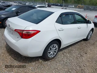 2019 Toyota Corolla L with VIN 5YFBURHE8KP949824, listed as a IAAI auction lot 41904385 with 112,054 mi miles. Bid and sale history available at carsss.com. Image 4.