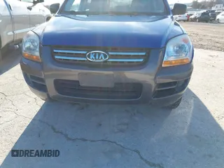 2005 Kia Sportage LX with VIN KNDJF723157097517, listed as a IAAI auction lot 41485759 with 207,294 mi miles and . Bid and sale history available at carsss.com. Image 6.