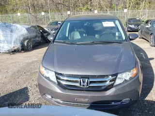 2015 Honda Odyssey Touring Elite with VIN 5FNRL5H99FB094727, listed as a IAAI auction lot 42001288 with 254,015 mi miles and . Bid and sale history available at DreamBid. Image 13.
