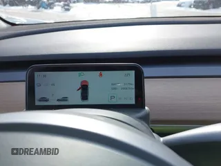 2022 Tesla Model 3 Long Range with VIN 5YJ3E1EB6NF114723, listed as a IAAI auction lot 41396258 with 2,179 mi miles and . Bid and sale history available at DreamBid. Image 7.