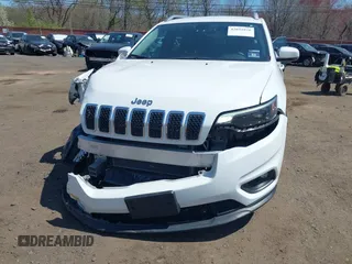 2019 Jeep Cherokee Latitude Plus with VIN 1C4PJMLXXKD107760, listed as a IAAI auction lot 42052926 with 82,649 mi miles and . Bid and sale history available at DreamBid. Image 6.