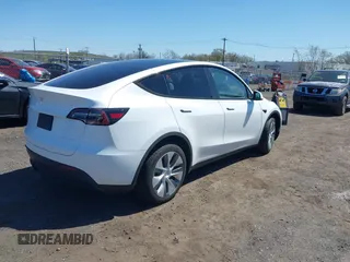 2023 Tesla Model Y Long Range with VIN 7SAYGDEE3PA201719, listed as a IAAI auction lot 42048816 with Not Provided miles and . Bid and sale history available at DreamBid. Image 4.