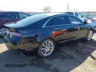 2015 Lincoln MKZ with VIN 3LN6L2G93FR619701, listed as a IAAI auction lot 41794410 with 77,201 mi miles. Bid and sale history available at carsss.com. Image 4.