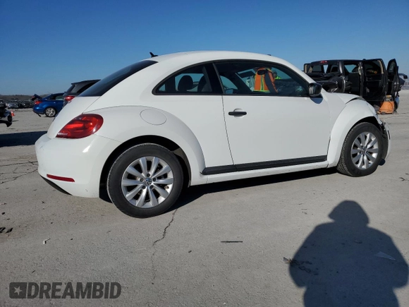 2014 Volkswagen Beetle Entry with VIN 3VWF17AT2EM646506, listed as a Copart auction lot 89149165 with 81,106 mi miles and Salvage title. Bid and sale history available at DreamBid. Image 3.
