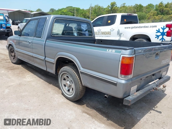 1992 Mazda B-Series Truck with VIN JM2UF313XN0306779, listed as a IAAI auction lot 42104583 with 137,826 mi miles and . Bid and sale history available at DreamBid. Image 3.