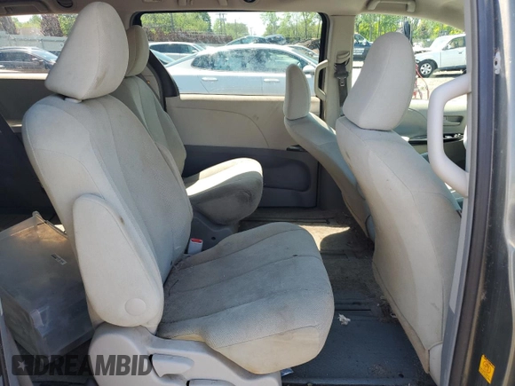 2012 Toyota Sienna with VIN 5TDZK3DC8CS198495, listed as a Copart auction lot 57335205 with 66,786 mi miles and Salvage title. Bid and sale history available at DreamBid. Image 11.