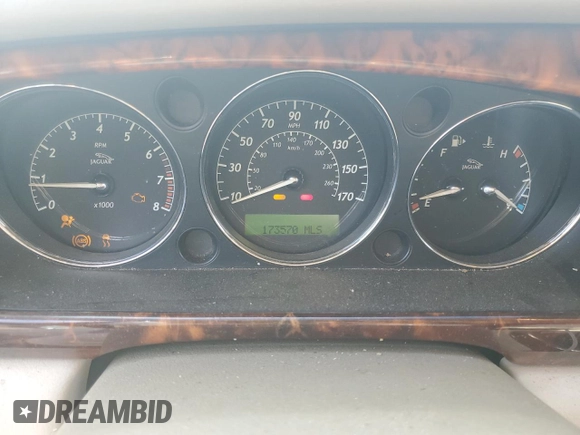 2004 Jaguar XJ with VIN SAJWA71C94SG24466, listed as a Copart auction lot 46610995 with 173,570 mi miles and Salvage Title. Bid and sale history available at carsss.com. Image 9.