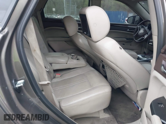 2014 Cadillac SRX Performance Collection with VIN 3GYFNCE33ES570472, listed as a IAAI auction lot 41971511 with 200,811 mi miles. Bid and sale history available at carsss.com. Image 8.