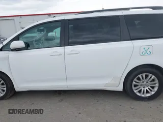 2011 Toyota Sienna XLE AAS with VIN 5TDYK3DC3BS161414, listed as a IAAI auction lot 41124705 with 167,364 mi miles. Bid and sale history available at carsss.com. Image 14.