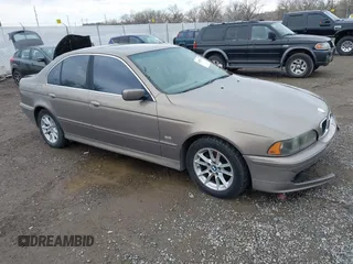 2003 BMW 5 Series 525iA with VIN WBADT43493G030122, listed as a IAAI auction lot 41889529 with 118,293 mi miles. Bid and sale history available at carsss.com. Image 1.