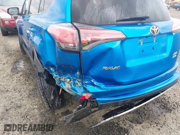 2018 Toyota RAV4 XLE with VIN 2T3RFREV0JW722354, listed as a IAAI auction lot 41974466 with 65,013 mi miles. Bid and sale history available at carsss.com. Image 12.
