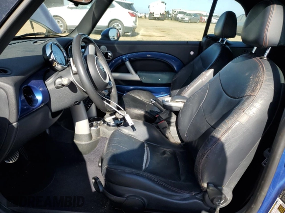 2005 MINI Convertible S z VIN WMWRH33565TK56154, wystawiony jako Copart lot #55860025 z przebiegiem 59 672 mil mil oraz Szkoda całkowita • Salvage title. Historia ofert i sprzedaży dostępna na DreamBid. Obrazek 7.