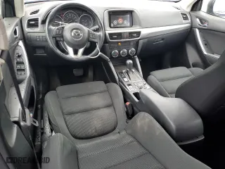 2016 Mazda CX-5 Touring with VIN JM3KE4CY4G0778032, listed as a Copart auction lot 52769065 with 81,443 mi miles and Salvage Title. Bid and sale history available at carsss.com. Image 8.