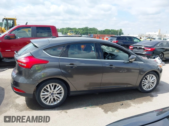 2018 Ford Focus Titanium with VIN 1FADP3N28JL323825, listed as a IAAI auction lot 42341286 with 46,565 mi miles and . Bid and sale history available at DreamBid. Image 13.