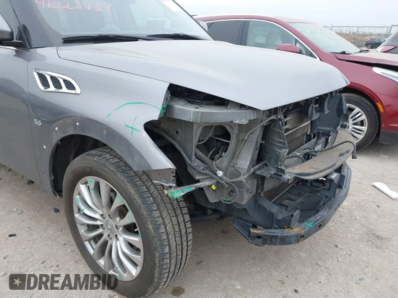 2015 Infiniti QX80 with VIN JN8AZ2NF1F9571315, listed as a IAAI auction lot 41522434 with 166,947 mi miles. Bid and sale history available at carsss.com. Image 17.