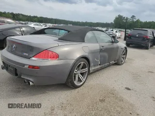 2007 BMW 6 Series M6 z VIN WBSEK93557CY78648, wystawiony jako Copart lot #52179345 z przebiegiem 22 453 mil mil oraz Szkoda całkowita • Salvage title. Historia ofert i sprzedaży dostępna na DreamBid. Obrazek 3.