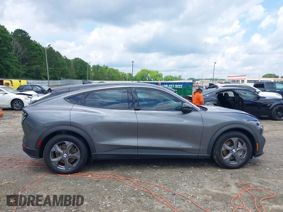 2023 Ford Mustang Mach-E Select z VIN 3FMTK1R48PMA76491, wystawiony jako IAAI lot #42255817 z przebiegiem 21 606 mil mil oraz . Historia ofert i sprzedaży dostępna na DreamBid. Obrazek 13.