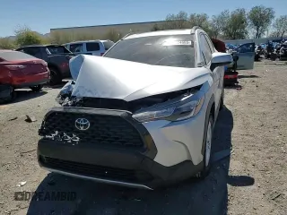 2023 Toyota Corolla Cross LE z VIN 7MUBAAAGXPV055740, wystawiony jako Copart lot #50434665 z przebiegiem 35 758 mil mil oraz Szkoda całkowita • Salvage title. Historia ofert i sprzedaży dostępna na DreamBid. Obrazek 11.