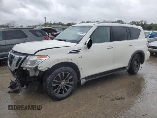 2017 Nissan Armada Platinum z VIN JN8AY2NE9H9703590, wystawiony jako Copart lot #73315744 z przebiegiem 76 818 mil mil oraz Nie do naprawy • Non repairable. Historia ofert i sprzedaży dostępna na DreamBid. Obrazek 1.