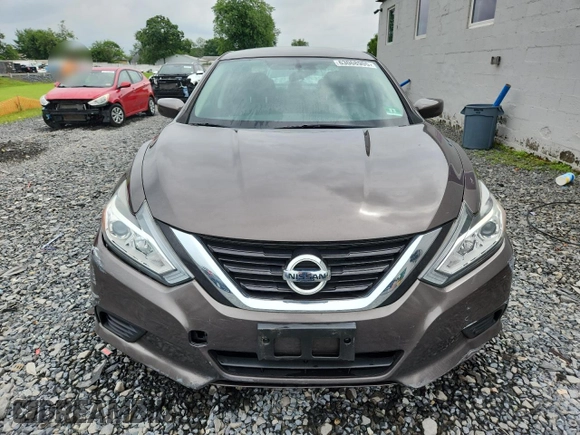 2016 Nissan Altima S with VIN 1N4AL3AP8GN313633, listed as a Copart auction lot 63068905 with 69,850 mi miles and Salvage title. Bid and sale history available at DreamBid. Image 5.